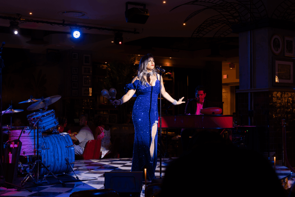 Live singer performing during dinner at Havana 1957, the ideal choice for a romantic dinner with live music in Miami Beach